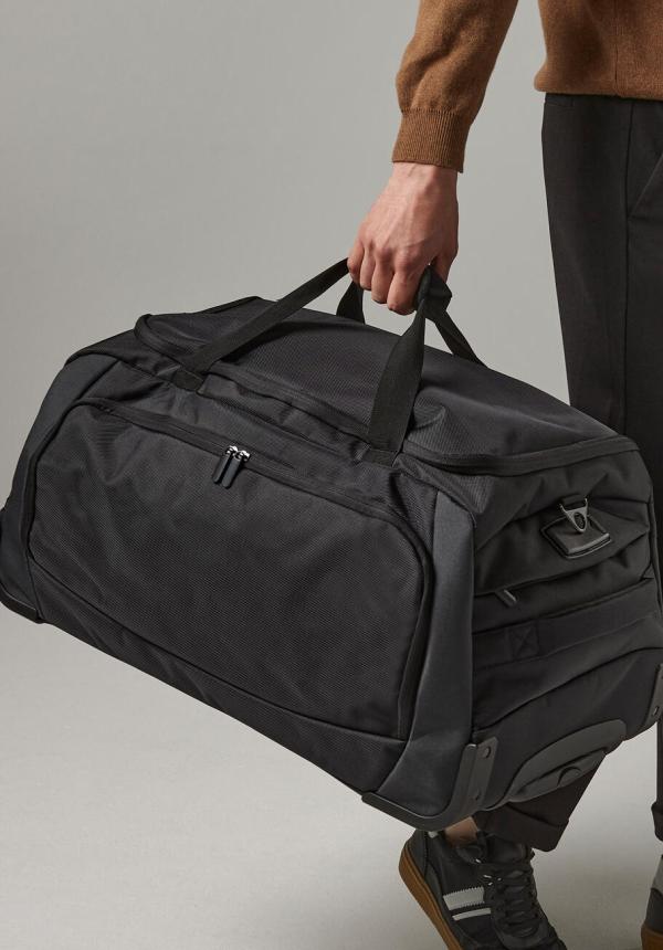 FR 62730 - Tungsten™ Wheelie Travel Bag